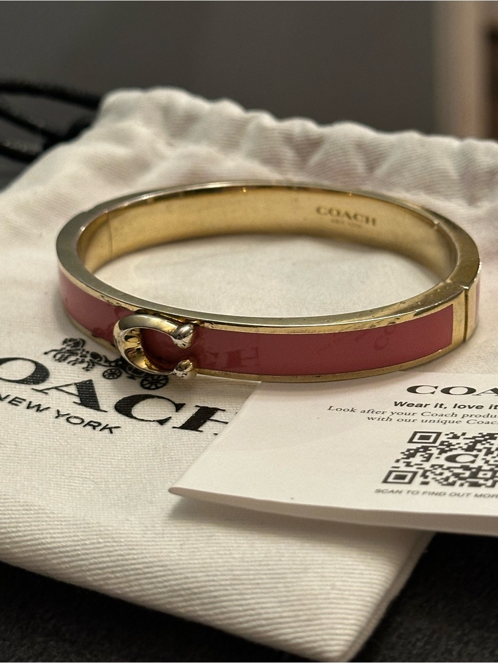 Coach Signature Gold-Tone Bangle with Pink Enamel Inlay - Picture 2 of 5